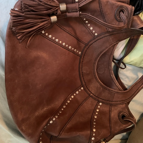 Fossil Handbags - New used Fossil quality leather in chocolate brown. 18”x12”high good condition